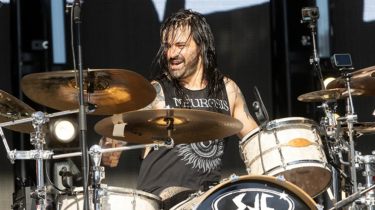 Jay Weinberg performing on stage as a drummer