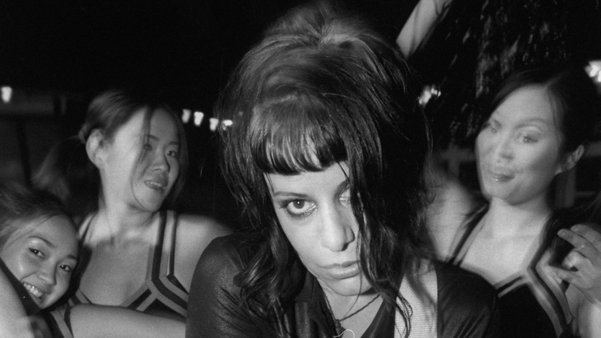 Late L7 bassist Jennifer Finch performing on stage