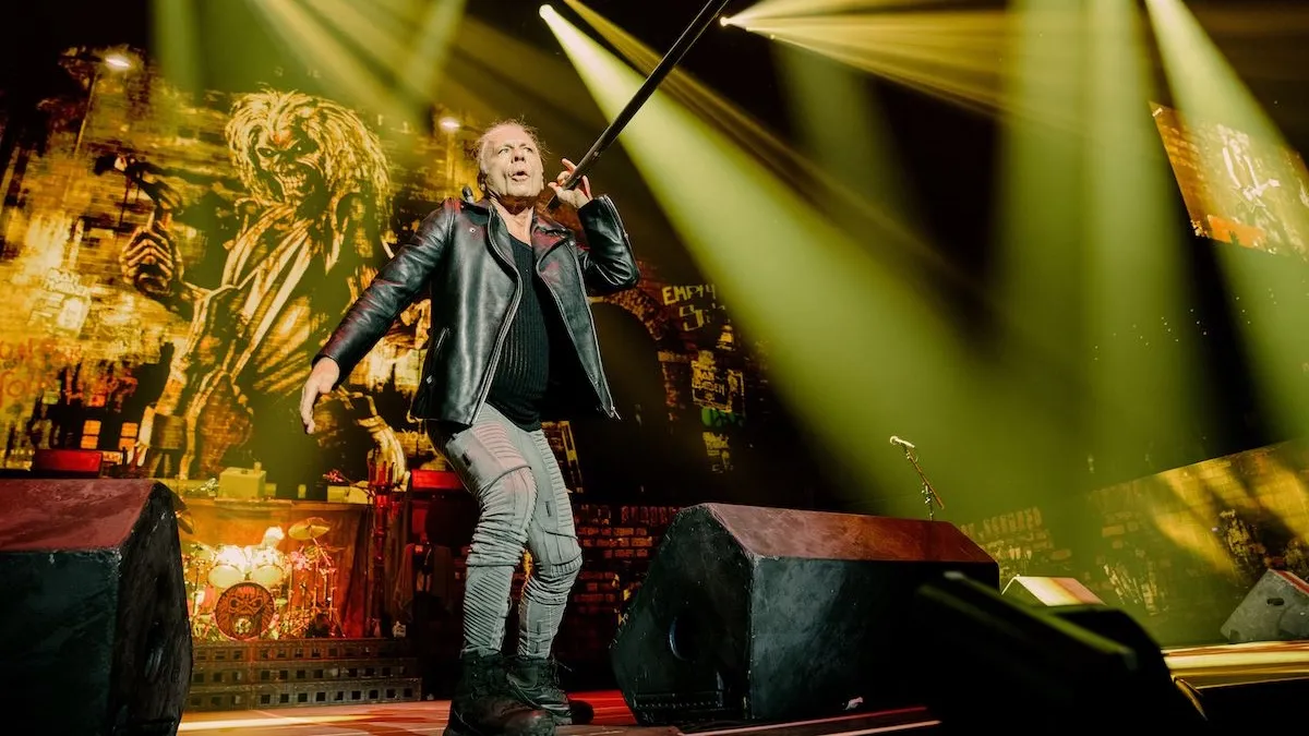 Bruce Dickinson performing on stage with Iron Maiden in Toronto
