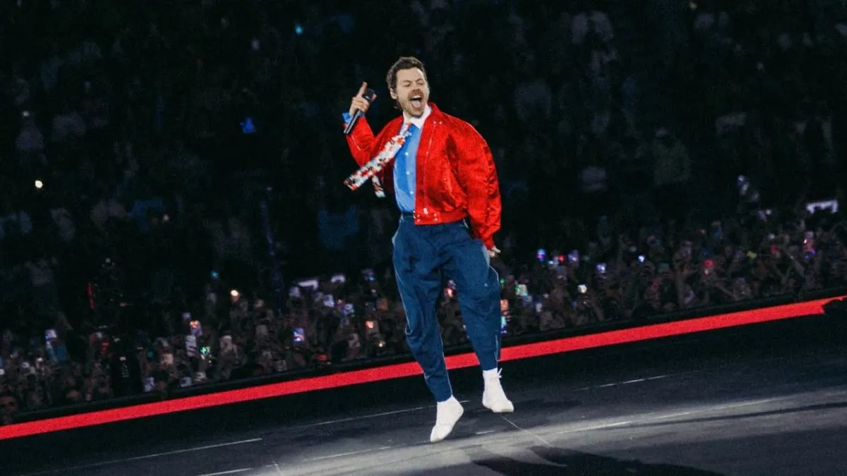 Harry Styles performing live on stage during his residency show