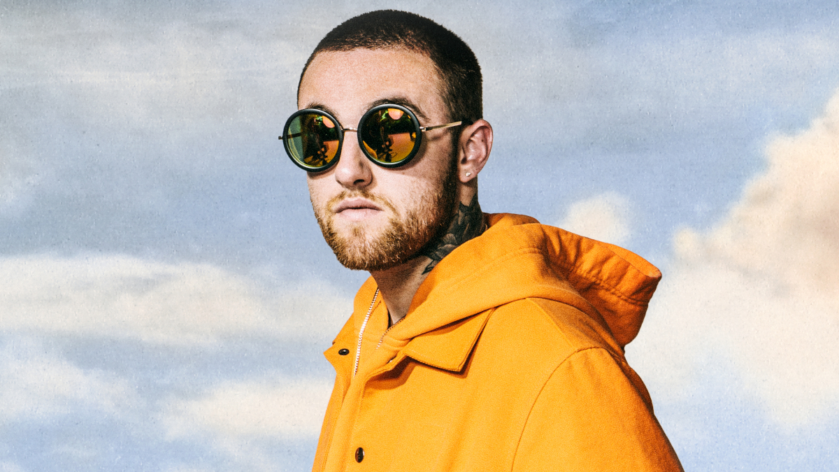 Late rapper Mac Miller performing on stage during a concert.