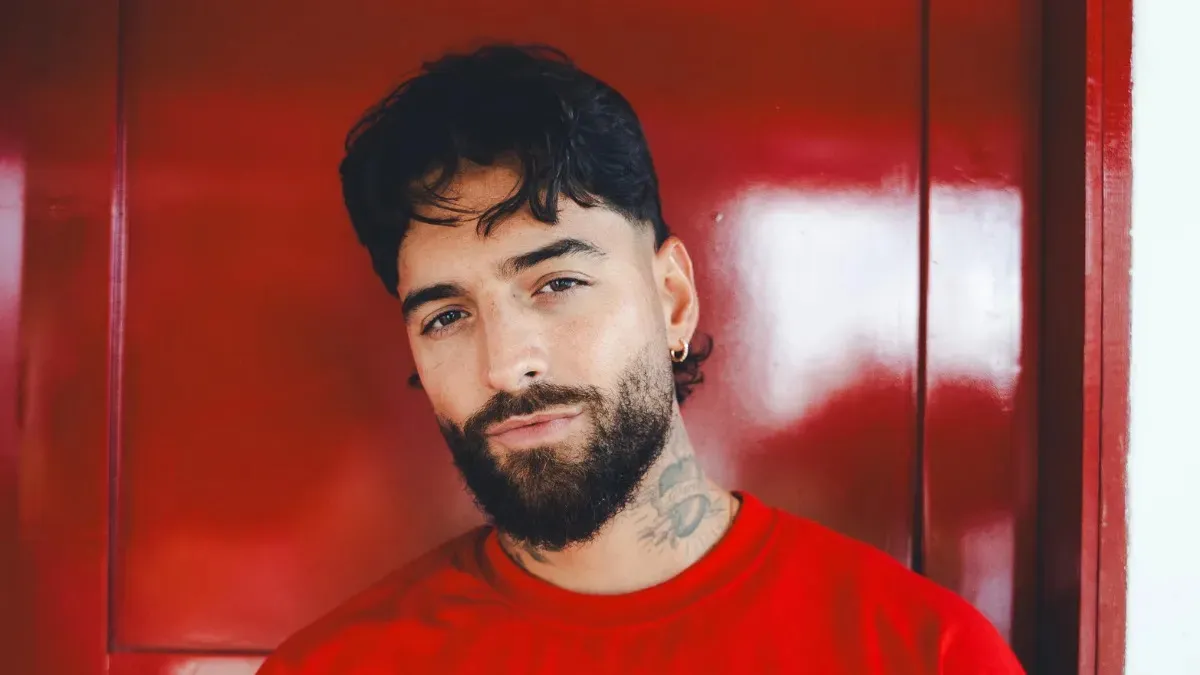 Maluma speaking about his career and fatherhood