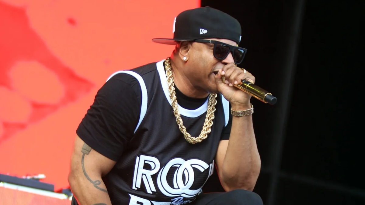 LL Cool J performing on stage at a festival