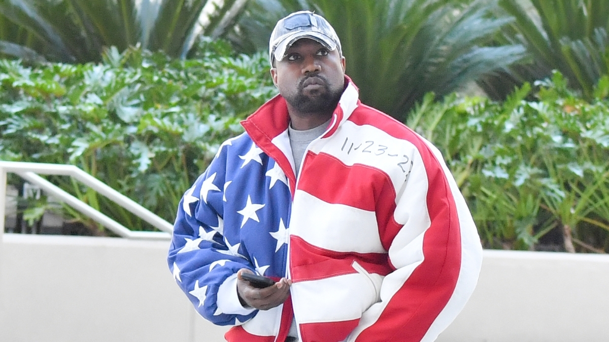 Kanye West performing live on stage during a concert