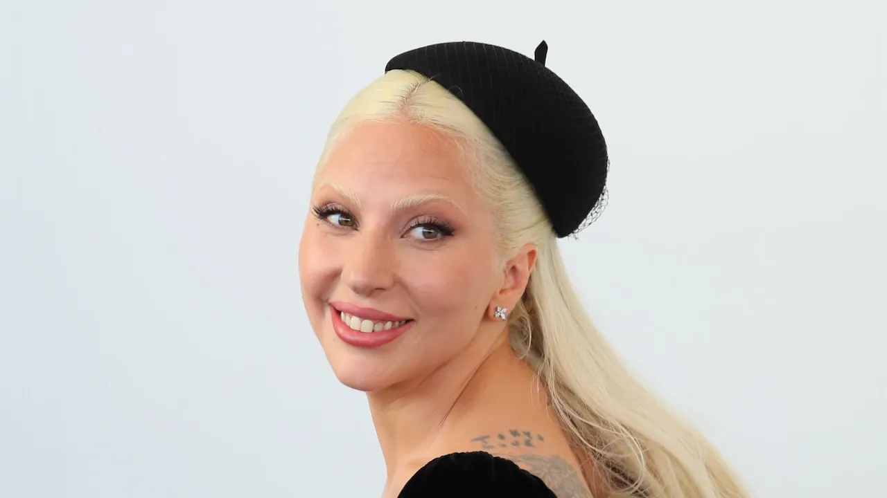 Lady Gaga smiling alongside fiancé Michael Polansky.