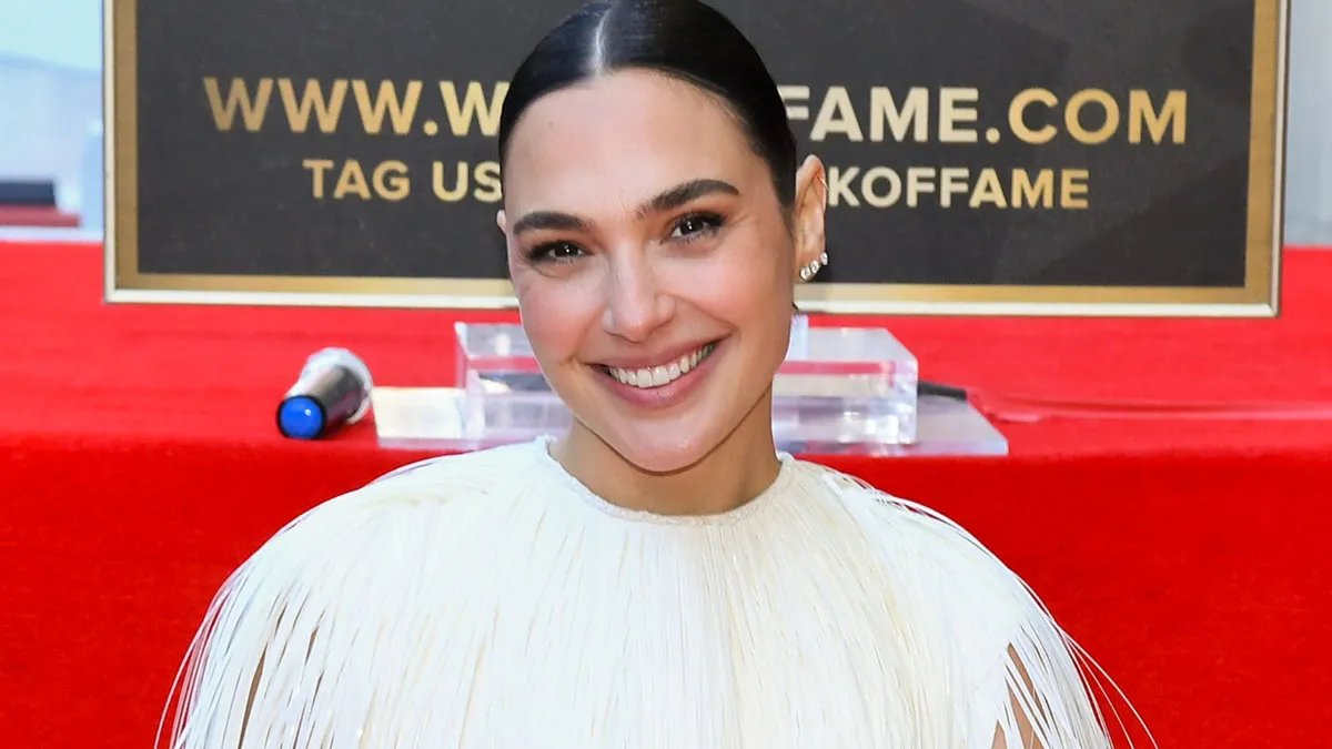 Gal Gadot speaking at a public event