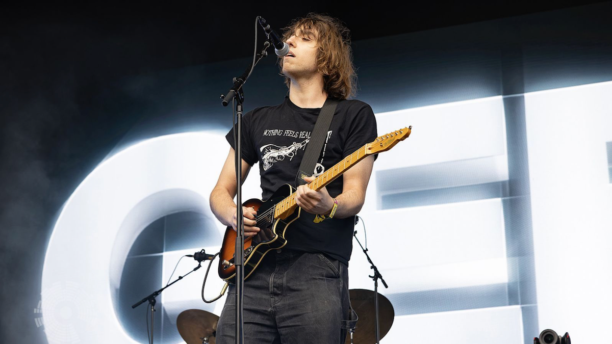 Geese bassist Dominic DiGesu and frontman Cameron Winter perform live on stage