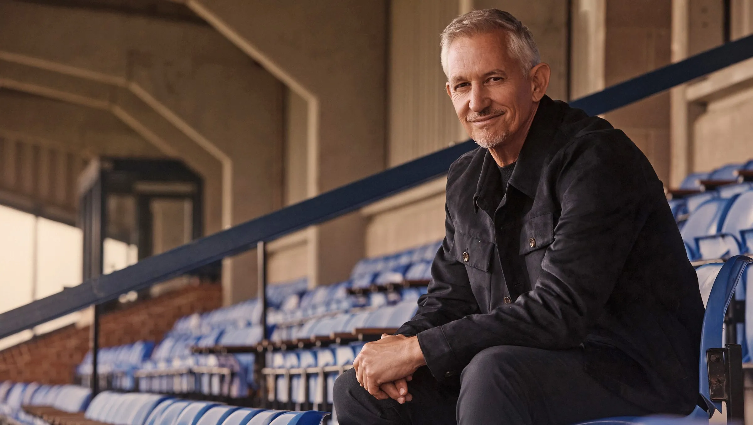 Gary Lineker attending a media event in a dark suit