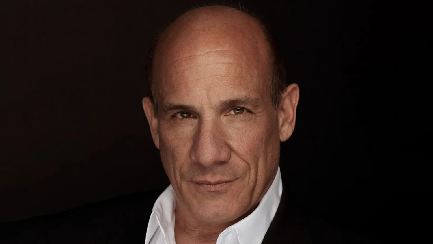 Actor Paul Ben-Victor attending a Hollywood red carpet premiere