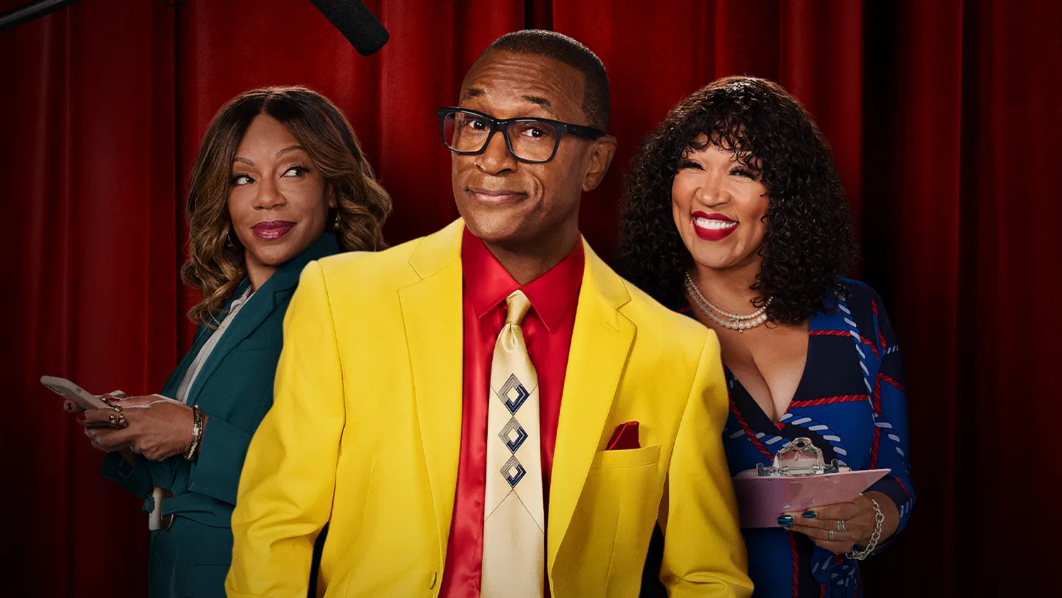 Tommy Davidson as Varnell Hill in a modern TV studio set
