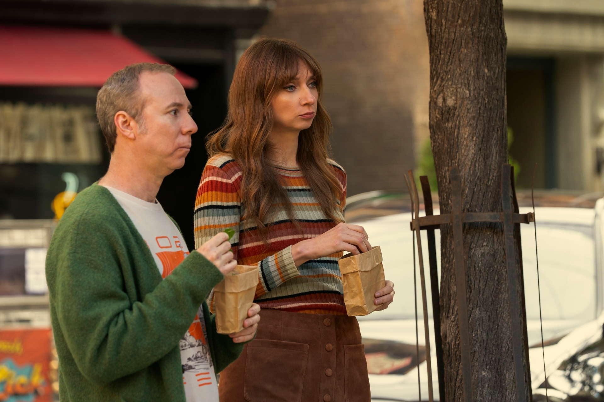 Kevin Sussman and Lauren Lapkus smiling together at a Hollywood television event
