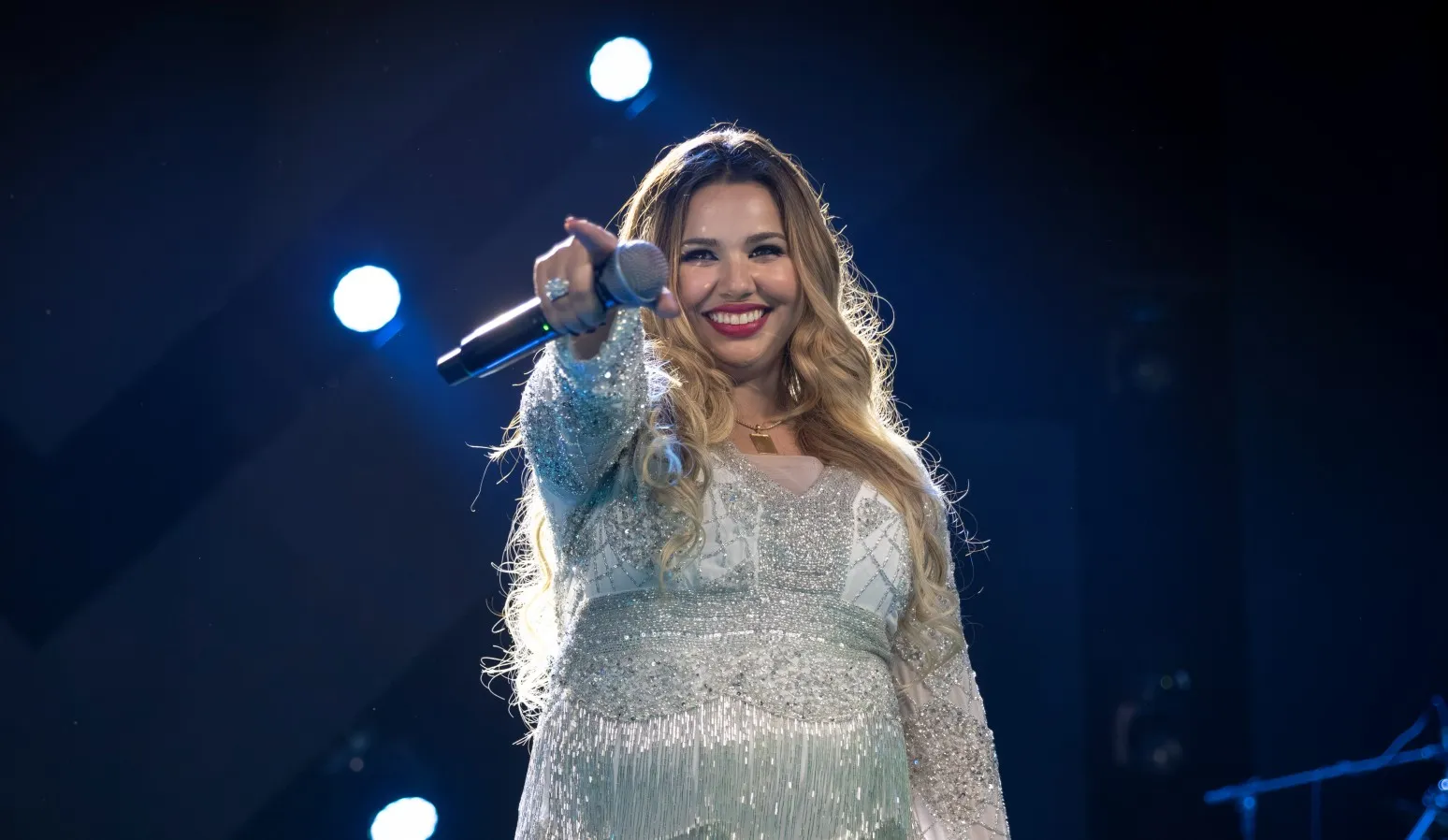 Late Brazilian music icon Marília Mendonça performing live on stage