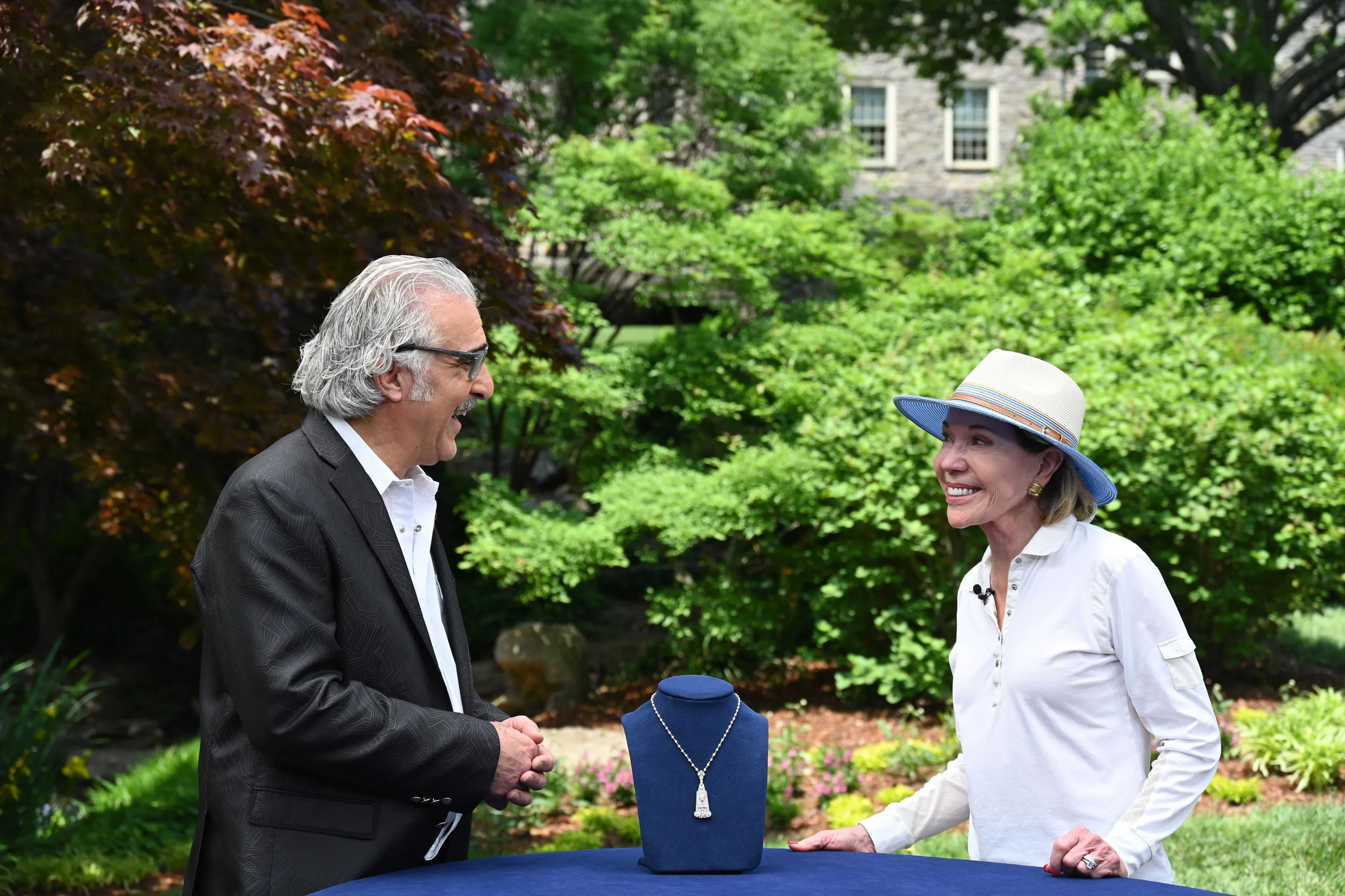 Antiques Roadshow host and set setup during a broadcast