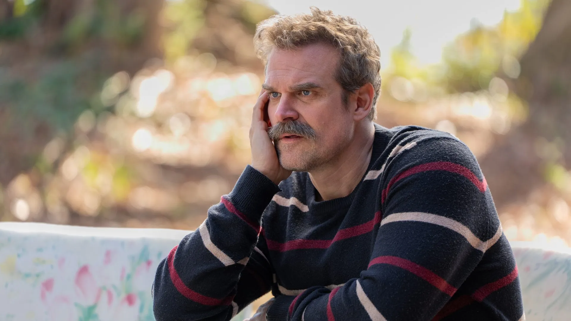 David Harbour speaking onstage at an awards ceremony