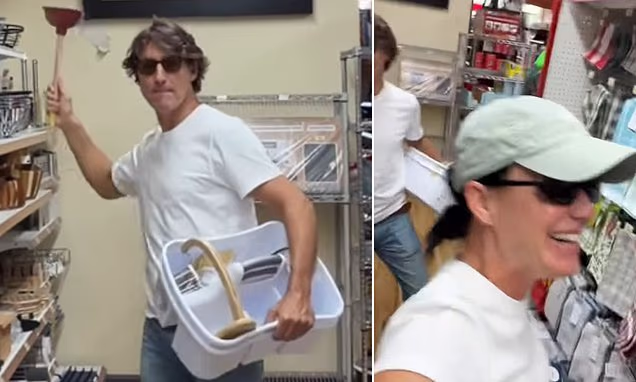 Katy Perry and Justin Trudeau dancing in a hardware store aisle holding a plunger