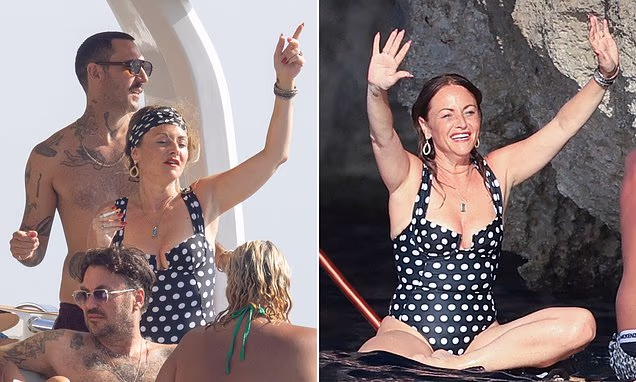 Jaime Winstone enjoying a coastal holiday in a swimwear look