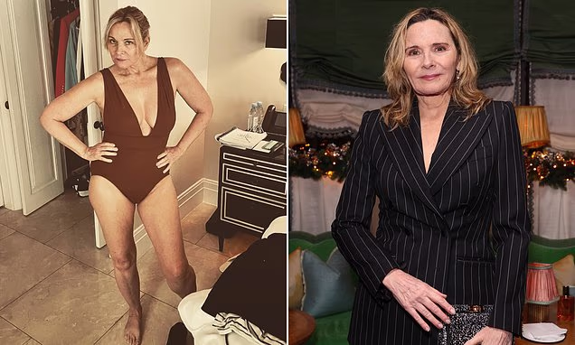 Kim Cattrall smiling on a red carpet in a glam red dress