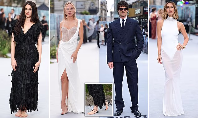 Margaret Qualley posing barefoot on the red carpet without her wedding ring at The Dog Stars premiere