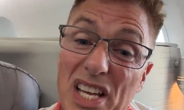 John Barrowman looking annoyed while traveling