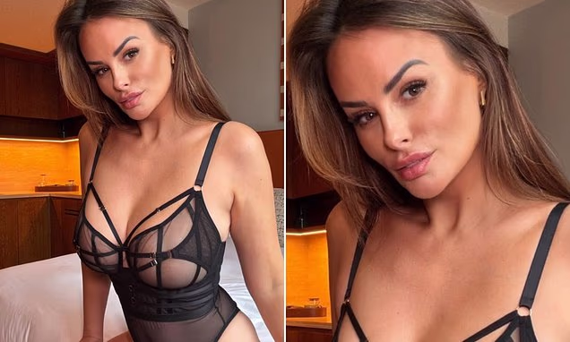Rhian Sugden posing in a plunging sheer bodysuit for a glamour photoshoot