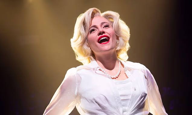 Pixie Lott performing on stage in a West End theater production