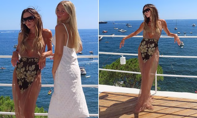 Victoria Beckham posing during an Italian holiday with daughter Harper Beckham