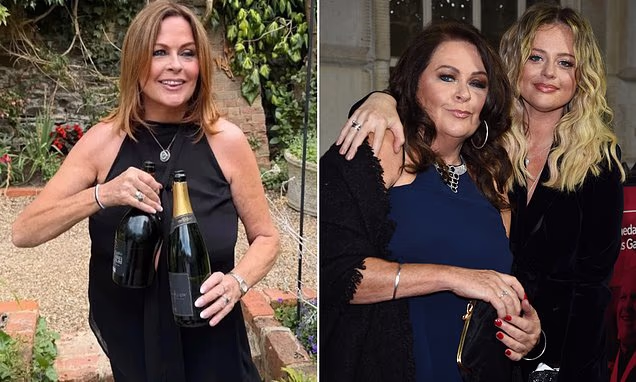 Actress Kate Robbins posing at an entertainment industry event.