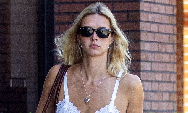 Apple Martin wearing a white strappy sundress while out in Los Angeles