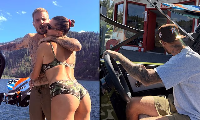 Justin Bieber and Hailey Bieber cuddling on a boat day with friends.