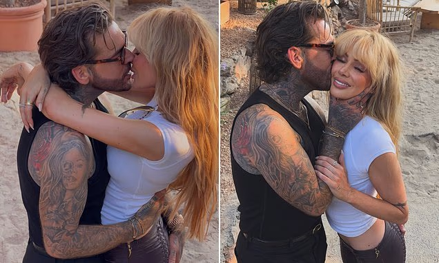 Olivia Attwood and Pete Wicks posing together during a summer vacation