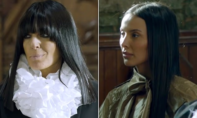 Claudia Winkleman wearing a dark cloak looking dramatic