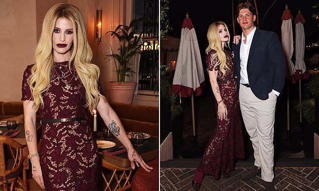 Kelly Osbourne wearing a gothic lace dress on a night out