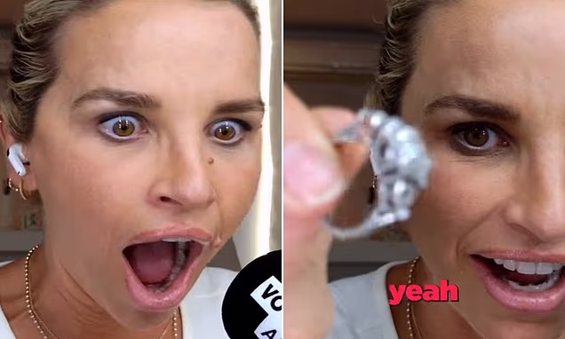Vogue Williams speaking into a podcast microphone with her hands in frame