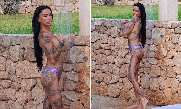 Katie Price lounging poolside in Ibiza displaying her tattoos and physique