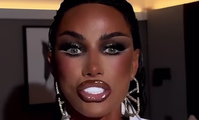 Katie Price attending an event on the red carpet with full glam makeup