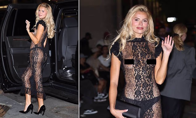 Brooks Nader stepping out in a sheer dress during New York Fashion Week