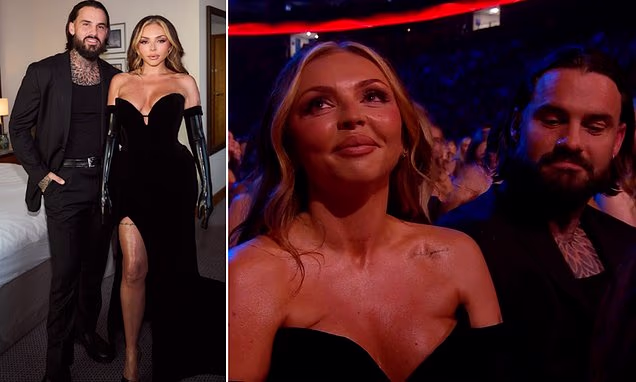 Jesy Nelson posing for cameras at a public event