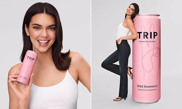 Kendall Jenner posing at a fashion event in a stylish outfit
