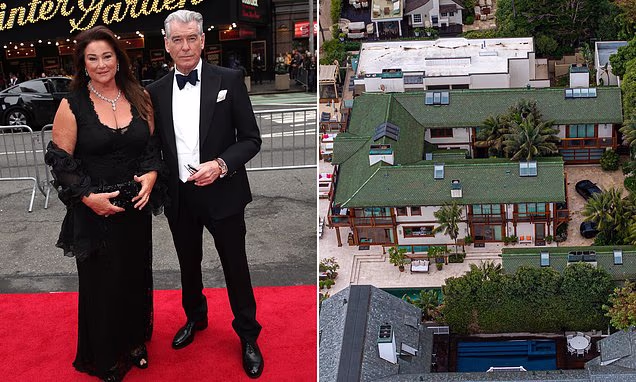 Pierce Brosnan and Keely Shaye Smith smiling at a Hollywood event