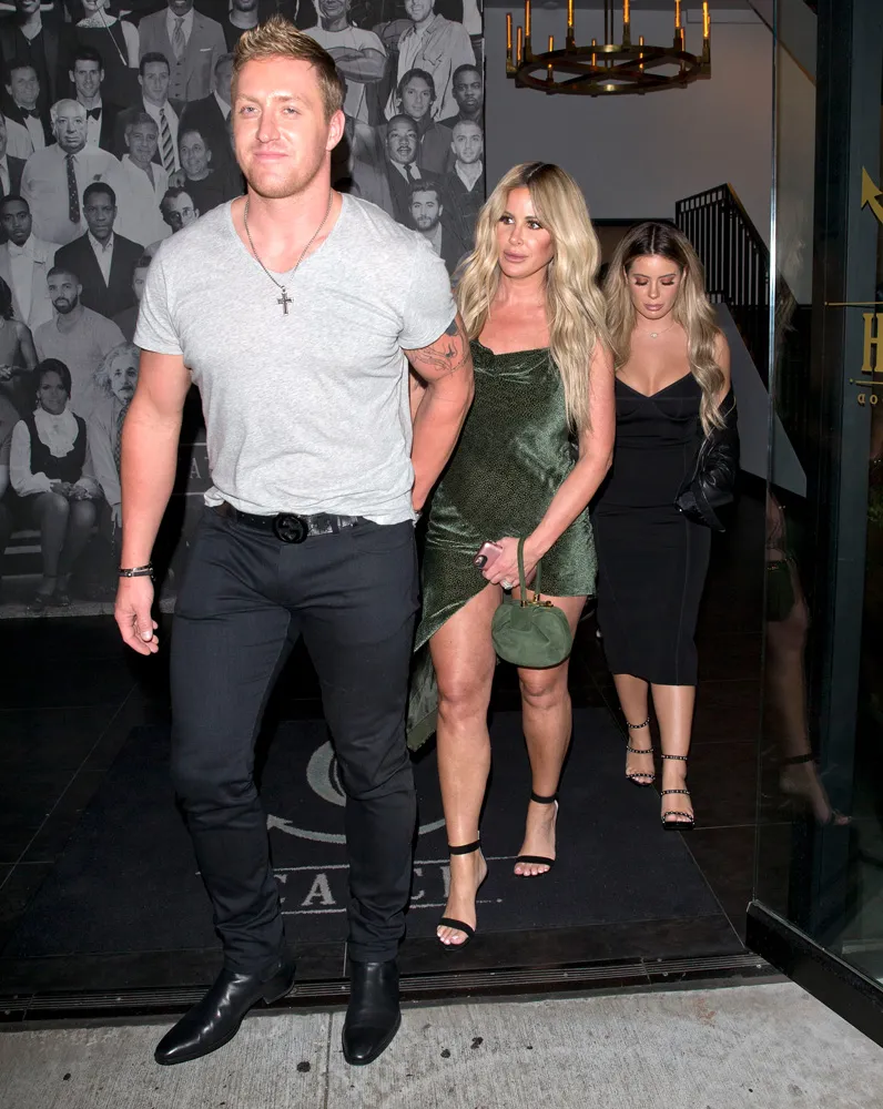 Kim Zolciak-Biermann, her husband Kroy Biermann and daughter Brielle Biermann were seen leaving dinner at 'Catch' Restaurant in Los Angeles, CA Pictured: Kim Zolciak-Biermann,Kroy Biermann,Brielle Biermann,Kim Zolciak-Bi