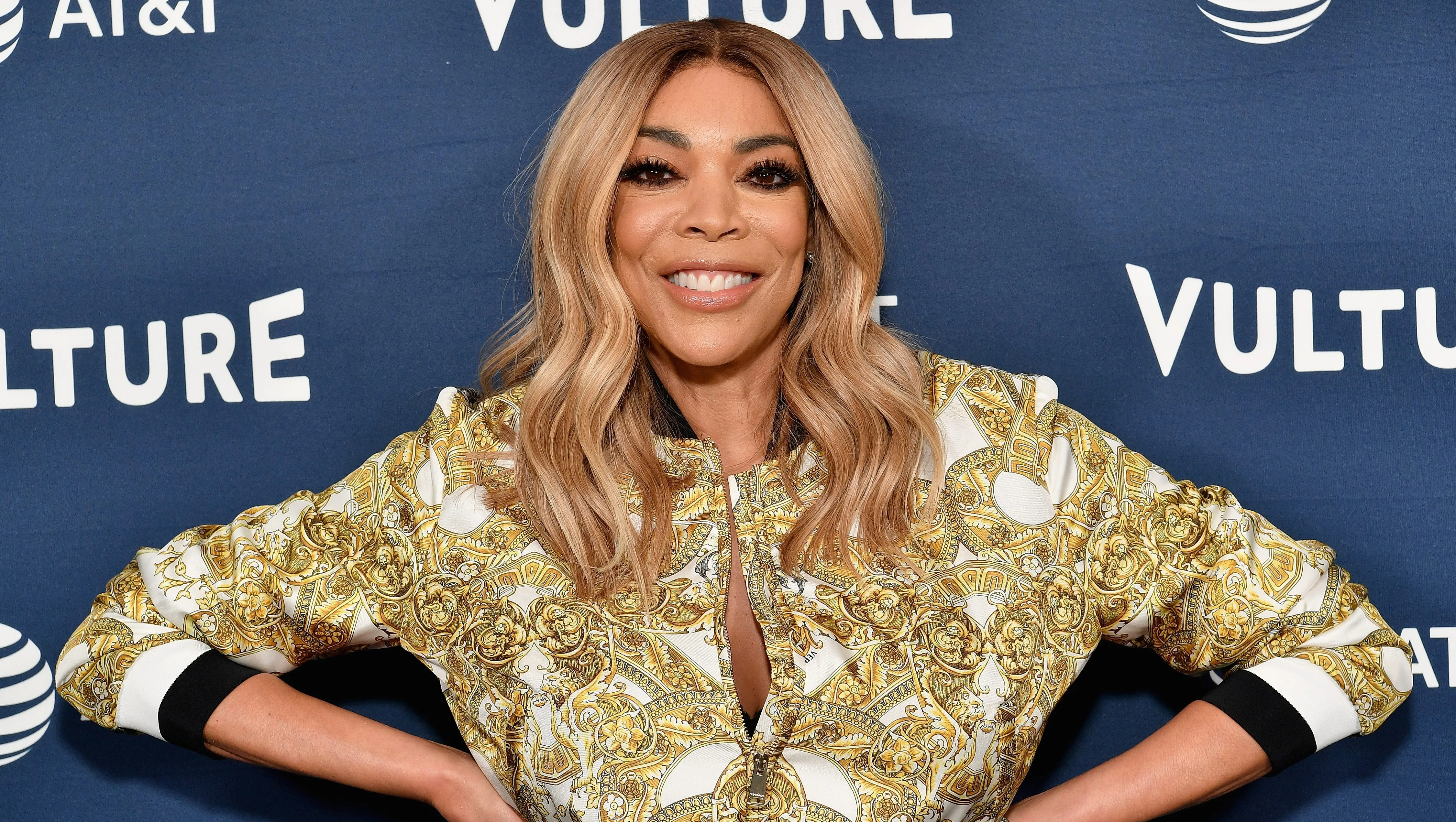 Wendy Williams smiling on a red carpet