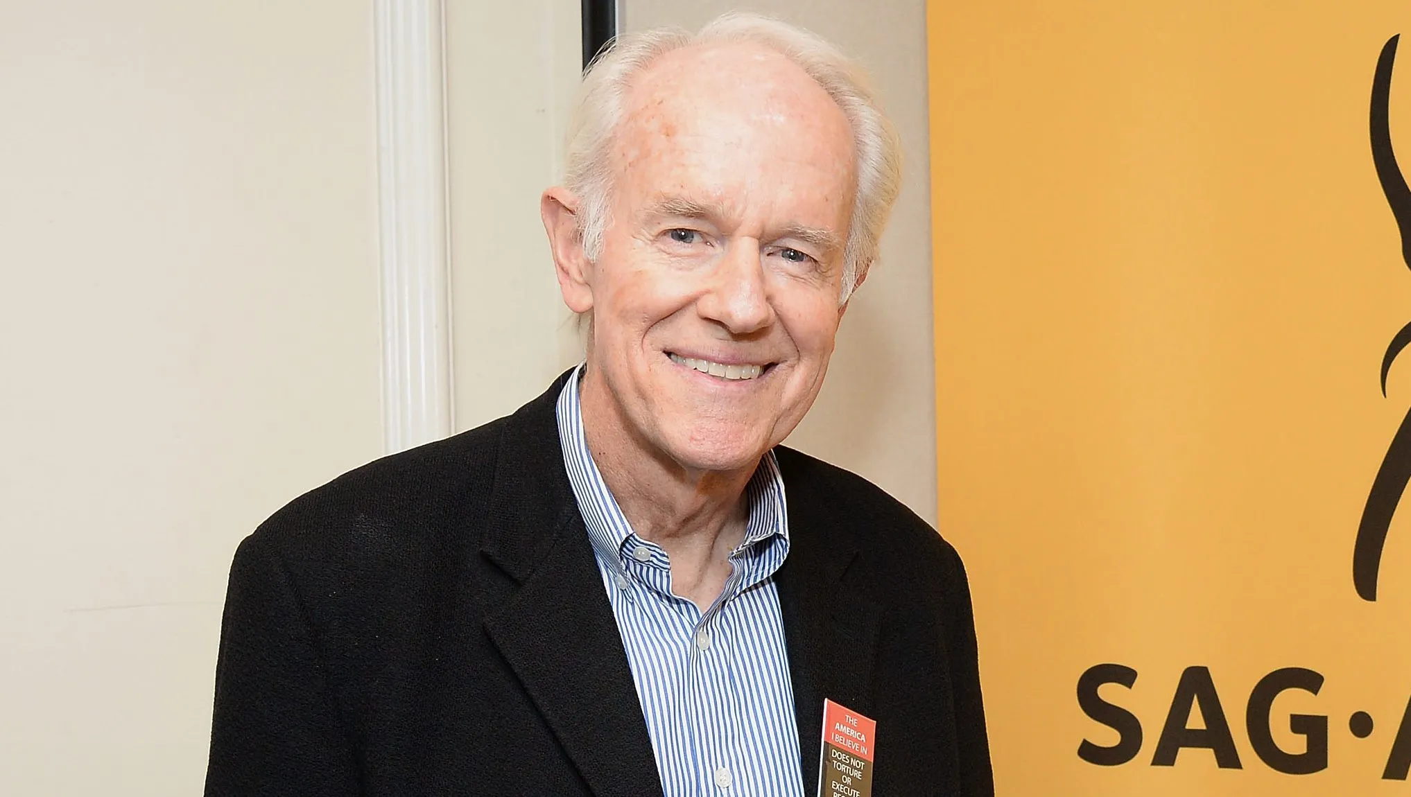 Shelley Fabares and husband Mike Farrell posing together at a Hollywood event