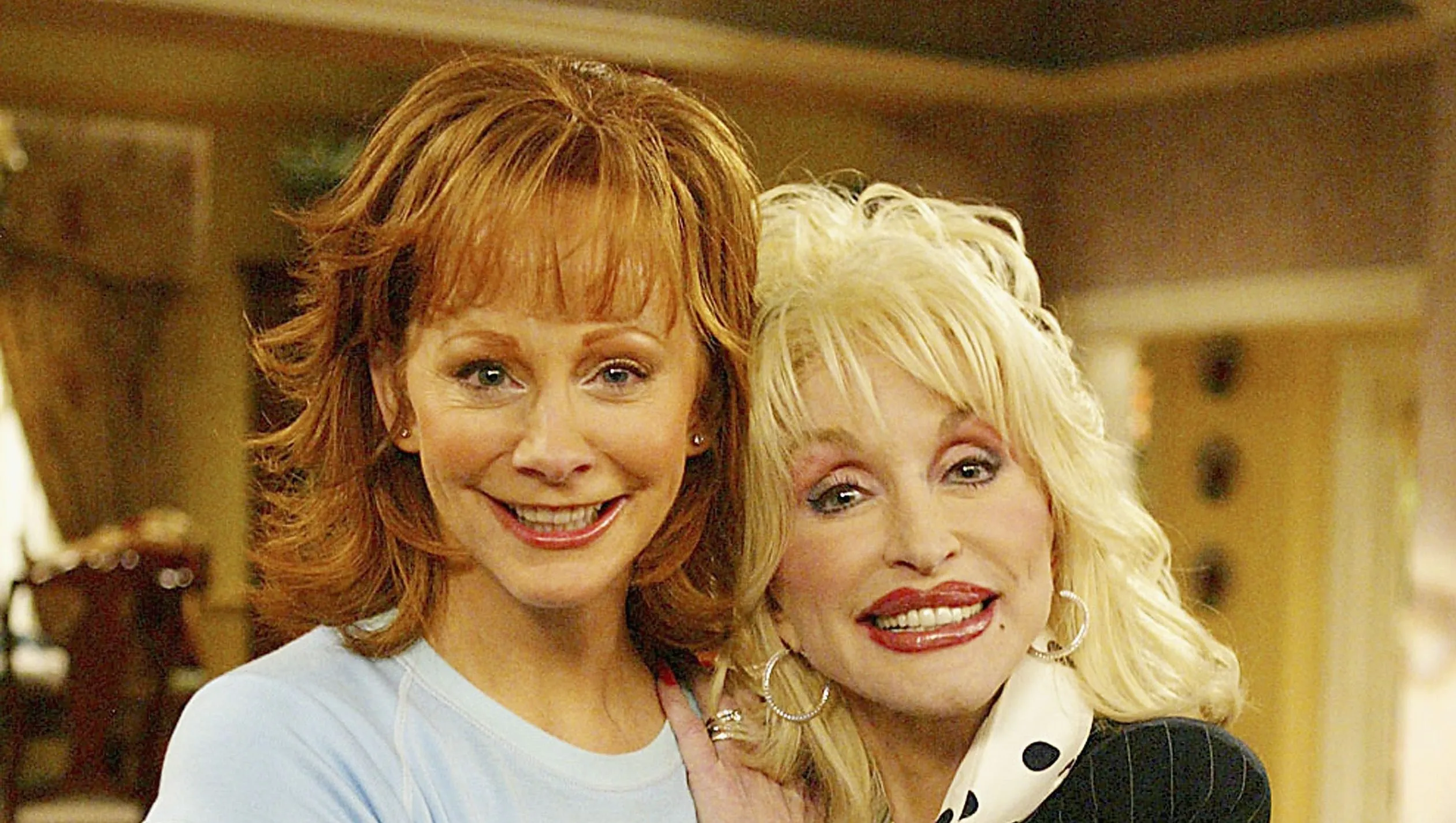 Country music legend Dolly Parton performing on stage.