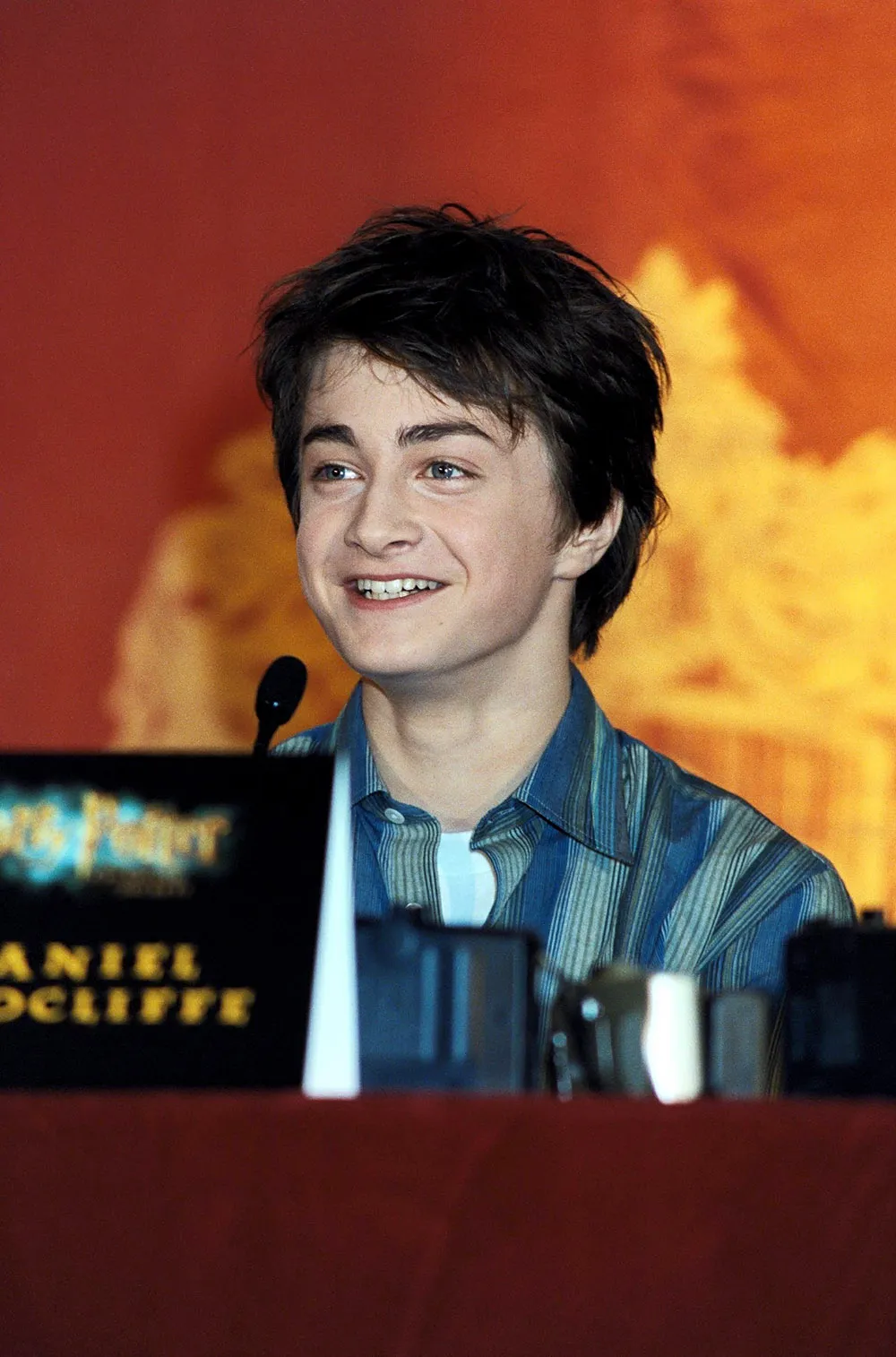 DANIEL RADCLIFFE HARRY POTTER AND THE CHAMBER OF SECRETS PHOTOCALL AND PRESS CONFERENCE CHANCERY COURT HOTEL LONDON, BRITAIN 25 OCT 2002