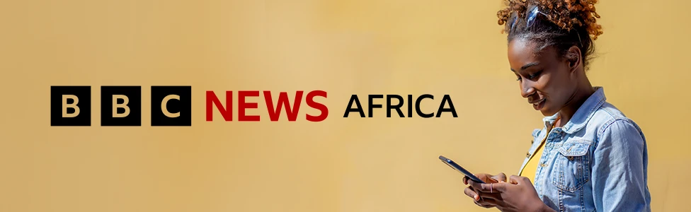To the right of the banner a woman with sunglasses on her head and wearing a denim jacket and yellow T-shirt looks down at her mobile phone. A graphic for BBC News Africa in black and red is on the left of the image whic