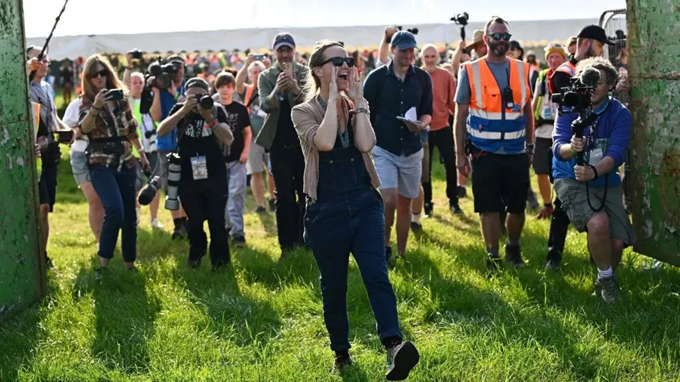 Emily Eavis, organiser of the annual Glastonbury Festival, officially opens the gates at Worthy Farm for the Glastonbury Festival, in Pilton, Somerset, Britain, June 26, 2024
