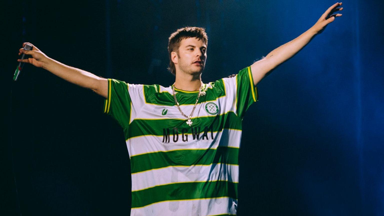 Fontaines D.C. frontman Grian Chatten performing on stage at Reading Festival