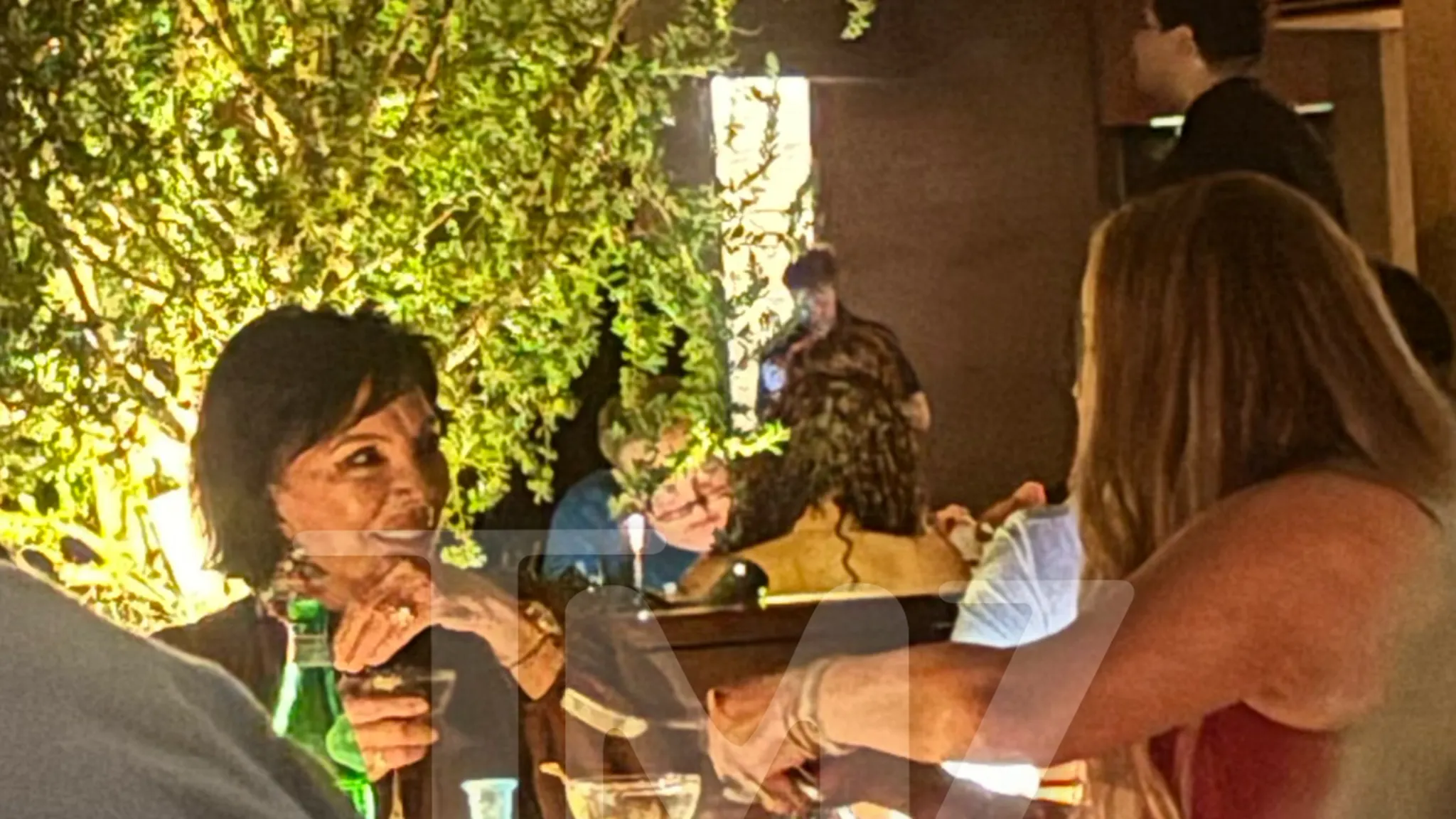 Kris Jenner and Mariah Carey chatting at Nobu Malibu