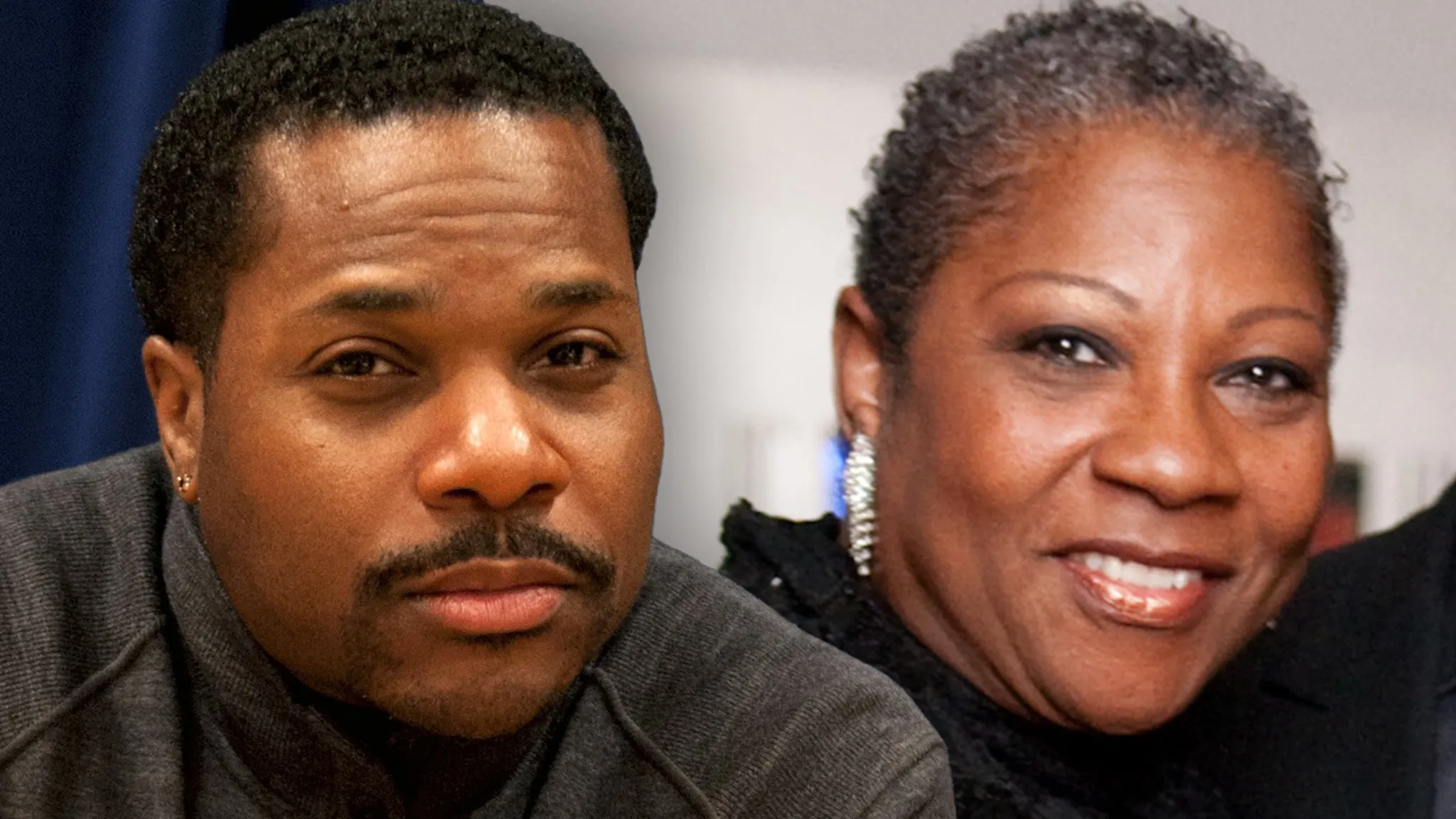 Malcolm-Jamal Warner smiling at a red carpet event