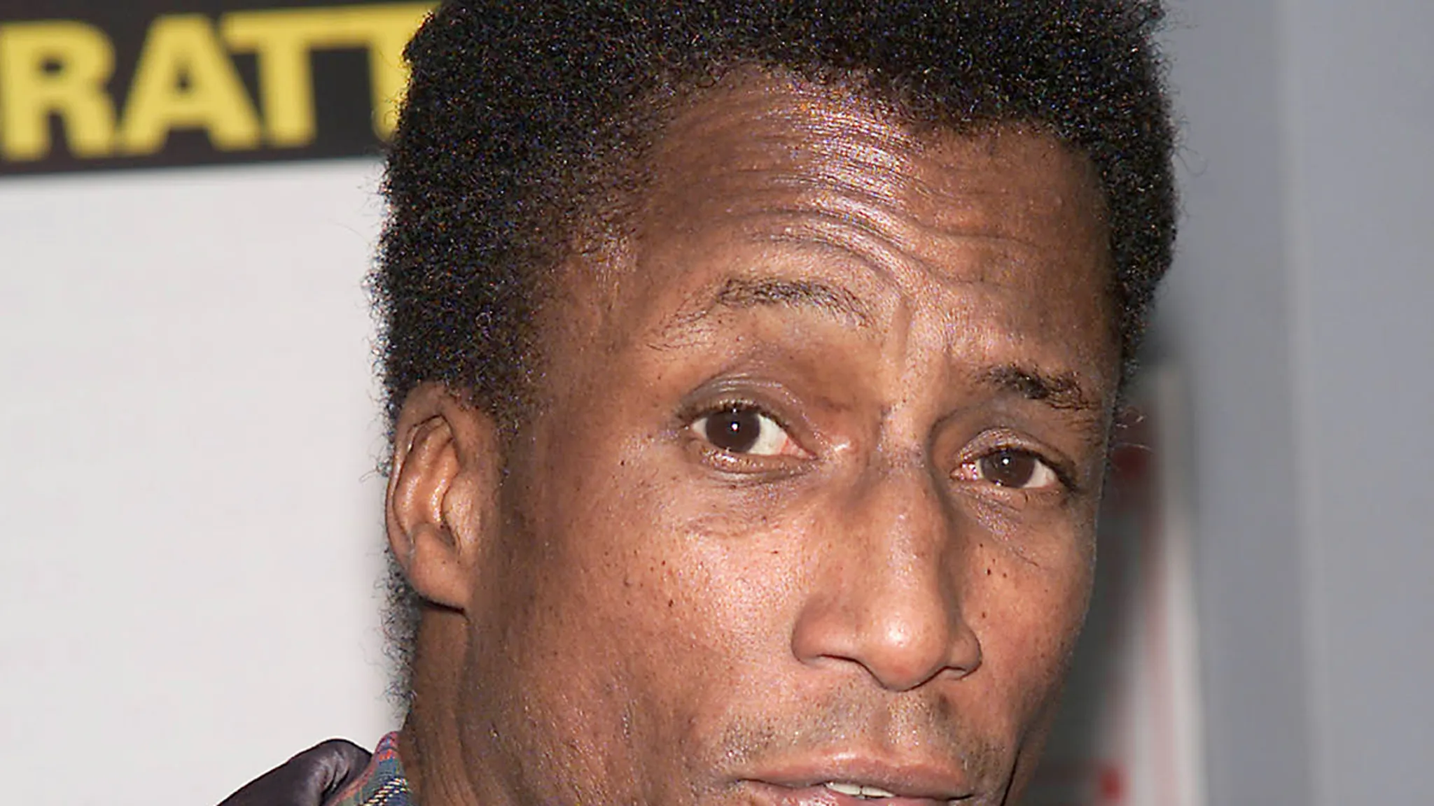 Actor Michael Wright posing at an event.